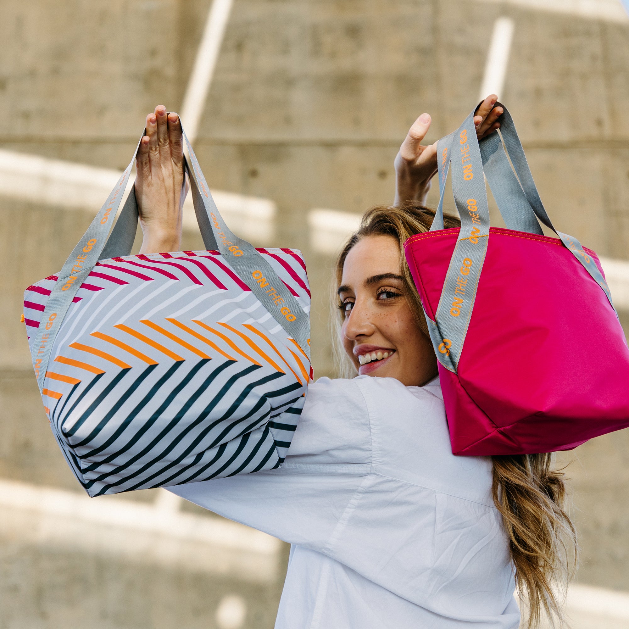 Lonchera Tote 3.7 Lt  On The Go Rayas Rosa IRIS Barcelona
